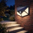 Luz LED solar com sensor de movimento 100 LED 13 x 9,5 cm Preta IP65 À prova de água 3 modos Ângulo de iluminação 270° Iluminação de parede 2