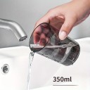 Magnetický nástěnný držák a průhledný plastový kelímek na zubní kartáček, lepicí montáž bez vrtání, zavěšení dnem vzhůru, bez elektřiny 2