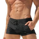 Maillots de bain pour hommes en polyester et spandex unis avec poche latérale à cordon élastique séchant rapidement coupe confortable 1