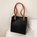 Mala de senhora em forma de shopper 27 x 31 x 11 cm Em pele sintética PU Alças longas com fecho metálico Olhais metálicos redondos 2