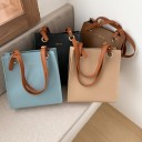 Mala de senhora em forma de shopper 27 x 31 x 11 cm Em pele sintética PU Alças longas com fecho metálico Olhais metálicos redondos 6