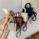 Mala mini crossbody para usar à mão ou cruzada Duas alças superiores e uma longa correia ajustável em pele PU e poliéster 18 x 9,5 x 6