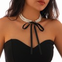 Meerlagige parel choker 36 cm met zwarte strik, elegante sluiting 4