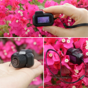 Minikamera 0,96 tuuman näytöllä 1080p 30fps Video 3760x2128p Valokuvaus 200mAh akku 100 minuuttia USB-hihna Avaimenperä Micro SD-kortti ei sisälly 2