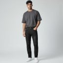 Moto Jeans mit orangefarbenen Waben-Knieschützern und Hüftschutz Netzpaneele und elastische Einsätze Polyester und Baumwolle Schwarz 3
