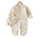 Mušelínoverall aus Baumwolle für Neugeborene mit langen Ärmeln und rundem Ausschnitt Beiger Unisex Overall mit Knöpfen und langen Hosenbeinen 1