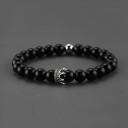 Naisten helmirannekoru kruunulla 1