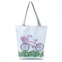 Naisten kangaskassi olalle 27 x 38 x 11 cm Valkoinen ostoskassi harmailla kahvoilla Värikäs printti kasveista tai polkupyörästä 2