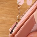 Naisten lompakko pitkällä vetoketjulla 11,5x1x9,5 cm yli 14 lokeroa kolikkotasku tupsulla pupulla elegantti ja kompakti muotoilu 3