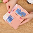 Naisten lompakko pitkällä vetoketjulla 11,5x1x9,5 cm yli 14 lokeroa kolikkotasku tupsulla pupulla elegantti ja kompakti muotoilu 4