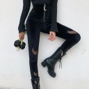 Naisten mustat housut, joissa on kuukuvioita 2