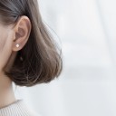 Naisten nappikorvakorut H833 2