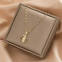 Necklace with Oval Medallion 1.6 × 2 cm with Relief Figure, Decorative Edge of Small Elements, Adjustable Chain 40–45 cm 2