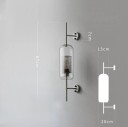 Nowoczesna lampa ścienna o podłużnym owalnym kształcie 67 x 13 cm szkło i metal gwint E27 bez żarówki 90-260 V do salonu i sypialni 4