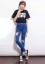 Nowoczesne jeansy damskie z dziurami J1388 2