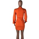 Orange minikjole med lange ærmer 2