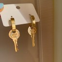 Orecchini da donna a cerchio con chiave 3