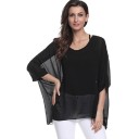 Oversized bluse i ensfarvet 1