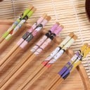 Palillos de bambú con motivo de geisha para comidas asiáticas Set de 5 pares Cada par con un estampado diferente Puntas estriadas Longitud 22,5 cm 6