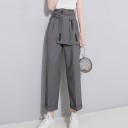 Pantalón de mujer con cinturón decorativo. 5