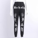 Pantalón deportivo negro de mujer con estampado 1