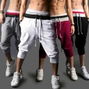Pantalones cortos elegantes hasta la rodilla para hombre 1