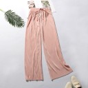 Pantalones holgados de mujer con cintura elástica. 9