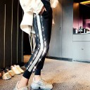 Pantaloni de trening pentru femei cu dungi de paiete 1