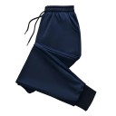 Pantaloni de trening pentru femei cu elastic în talie și șnur de strângere, cu pantaloni îngustați, manșete rib și buzunare 4