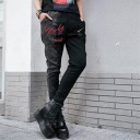 Pantaloni slim da donna con zip neri 1