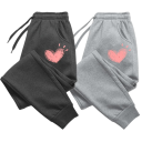 Pantalons de sport pour femmes unis avec impression de cœurs sur les côtés avec cordon de serrage Matériau polyester Pantalons confortables pour le temps libre 2