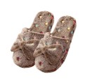 Pantofole da donna con pois e fiocco 8