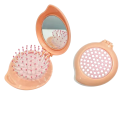 Peigne de voyage pliable avec miroir 8 x 7 x 3 cm Peigne à pression en forme de goutte avec des dents rondes Brosse de coiffage massante pour sac à main 5