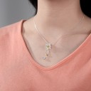 Pendentif Femme avec Fleur J189 1
