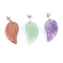 Pendentif pour femme avec aile 1