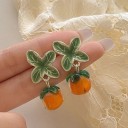 Pendientes colgantes de color naranja para mujer 7