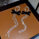 Pendientes colgantes de mujer con circonitas y lazo 2