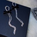 Pendientes colgantes de mujer con circonitas y lazo 4