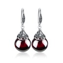 Pendientes colgantes de mujer con granates 1