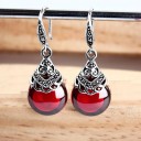 Pendientes colgantes de mujer con granates 3