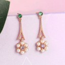 Pendientes colgantes de mujer con piedras y perlas. 4