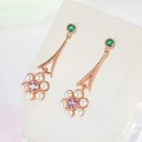 Pendientes colgantes de mujer con piedras y perlas. 5