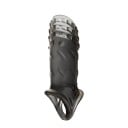 Penisholkki, jossa on kolme riviä ulokkeita ja ristikkäin tehtyjä viivoituksia sekä kuristusrengas pidennystä, kiinteämpää erektiota 1