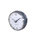 Pequeño reloj analógico con cuerpo de plástico redondo y cubierta transparente Esfera blanca clara Dimensiones 7,2 x 4 cm Alimentación 1x 1