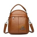Petit sac à main pour femmes à porter à la main ou en bandoulière Forme arrondie avec une anse supérieure Poche avant zippée Bandoulière 2