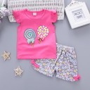 Pigersæt - T-shirt med slikkepinde og shorts med blomster J2493 1