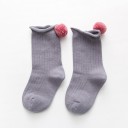 Pigestrømper med pompon 6