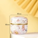 Plechová dvojitá krabička 8,5 × 8,5 cm jemný květinový motiv růžové květy na světlém podkladu se zlatým pruhem dóza s víkem 2