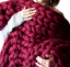 Pletená vlněná deka 100 x 120 cm 9