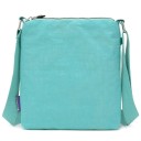 Plochá dámska crossbody kabelka cez rameno z nylonu Tri predné kapsy na zips Vnútorné kapsy Nastaviteľný popruh Rozmer 21 x 25 x 3 cm 14